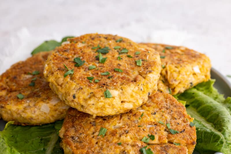 Close up of stack of fried Southern salmon patties.