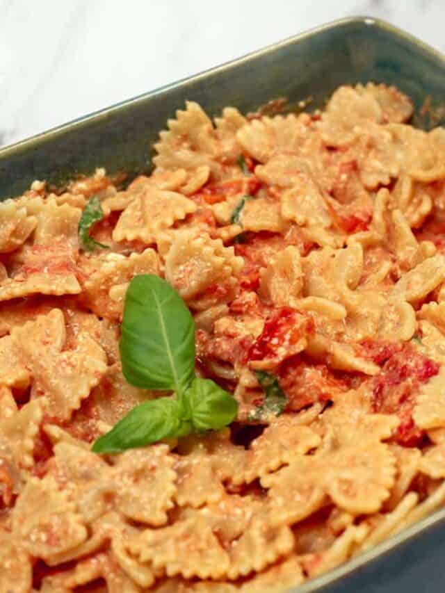 Tray of baked feta and tomato pasta.