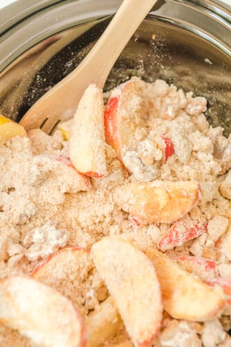 Add crumble topping to the crockpot.