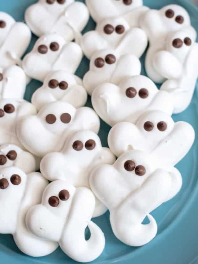 Plate of ghost meringue cookies.