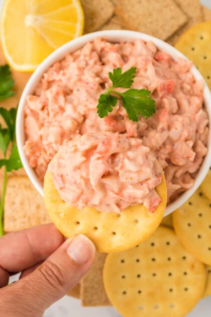 Cracker with crab dip.