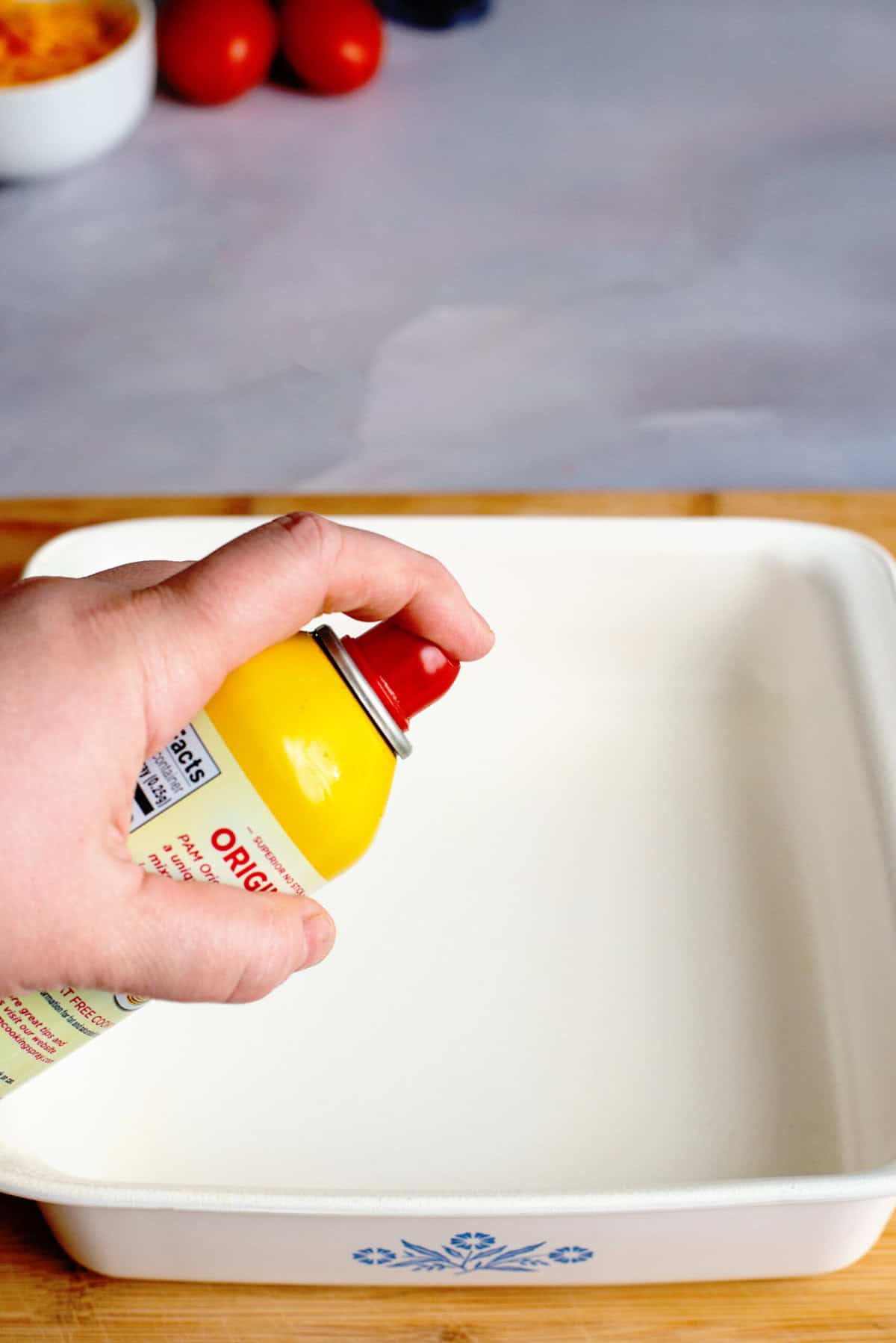 Spray baking dish with non-stick cooking spray