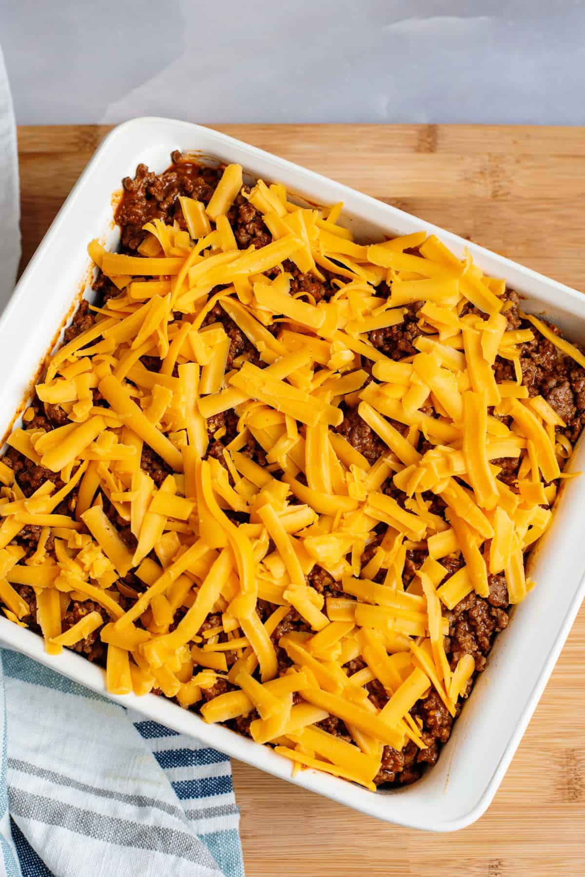 sprinkle cheese over beef mixture