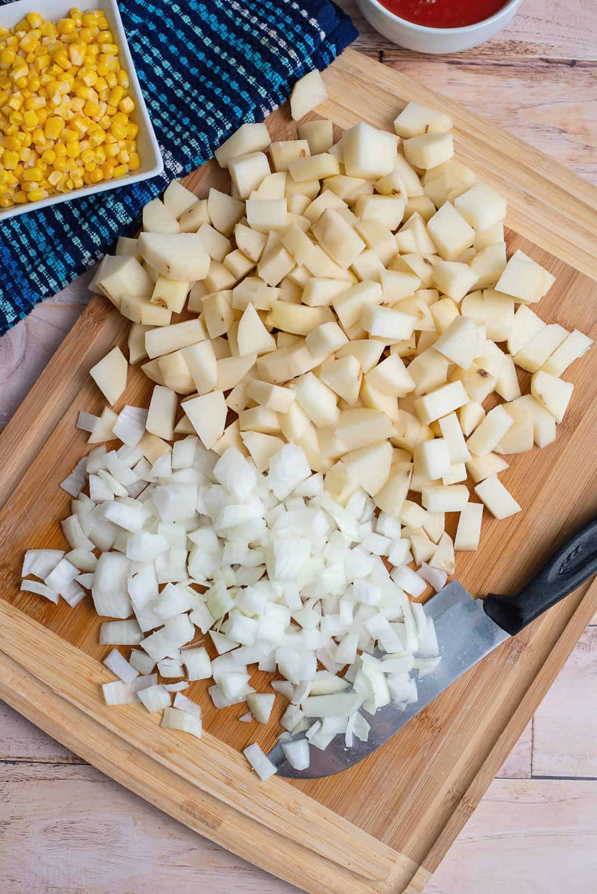 peel and dice potatoes and onions