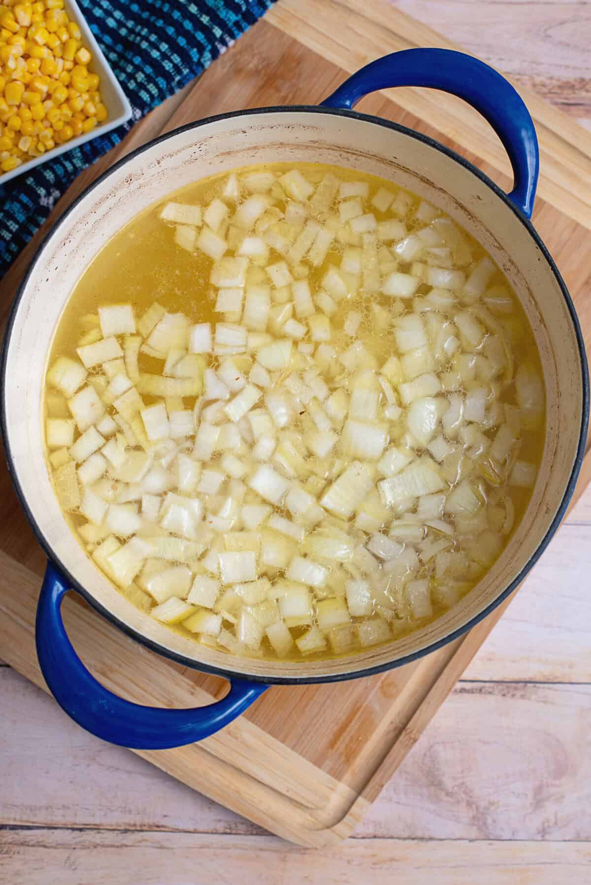 add potatoes and onions to reserved broth