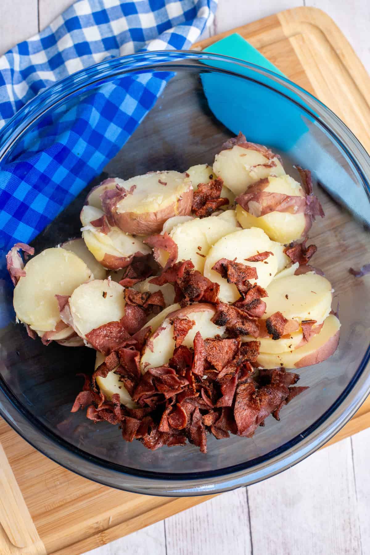 crumble bacon onto the potatoes