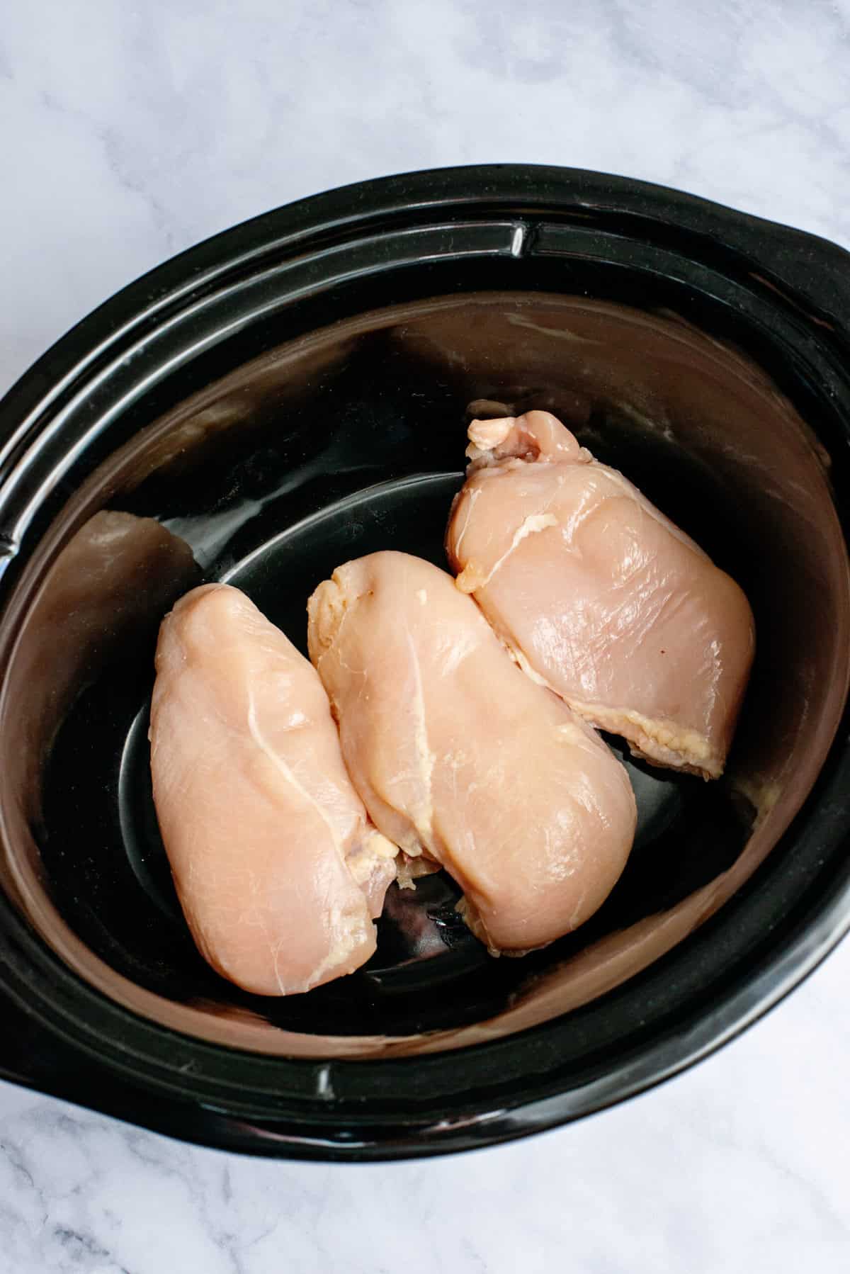 Place Chicken in slow cooker