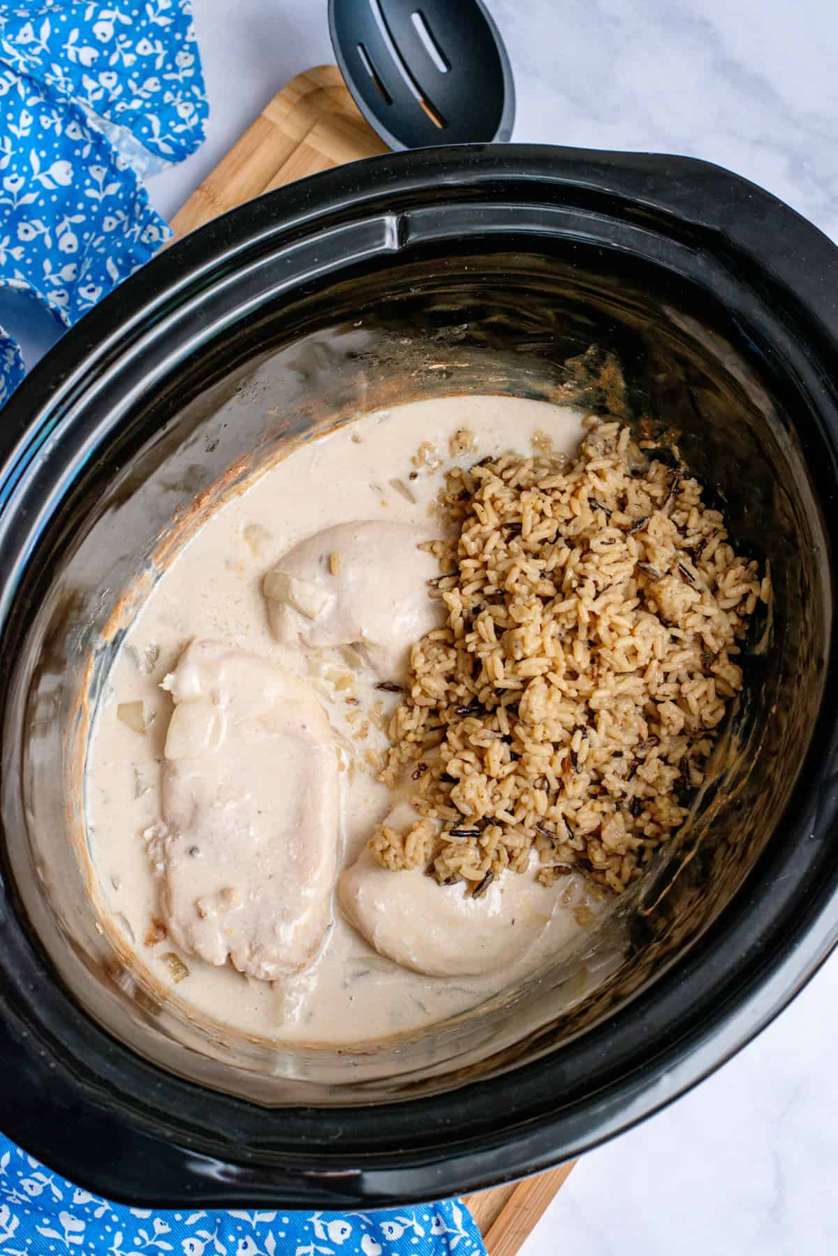 Add cooked long grain and wild rice to slow cooker