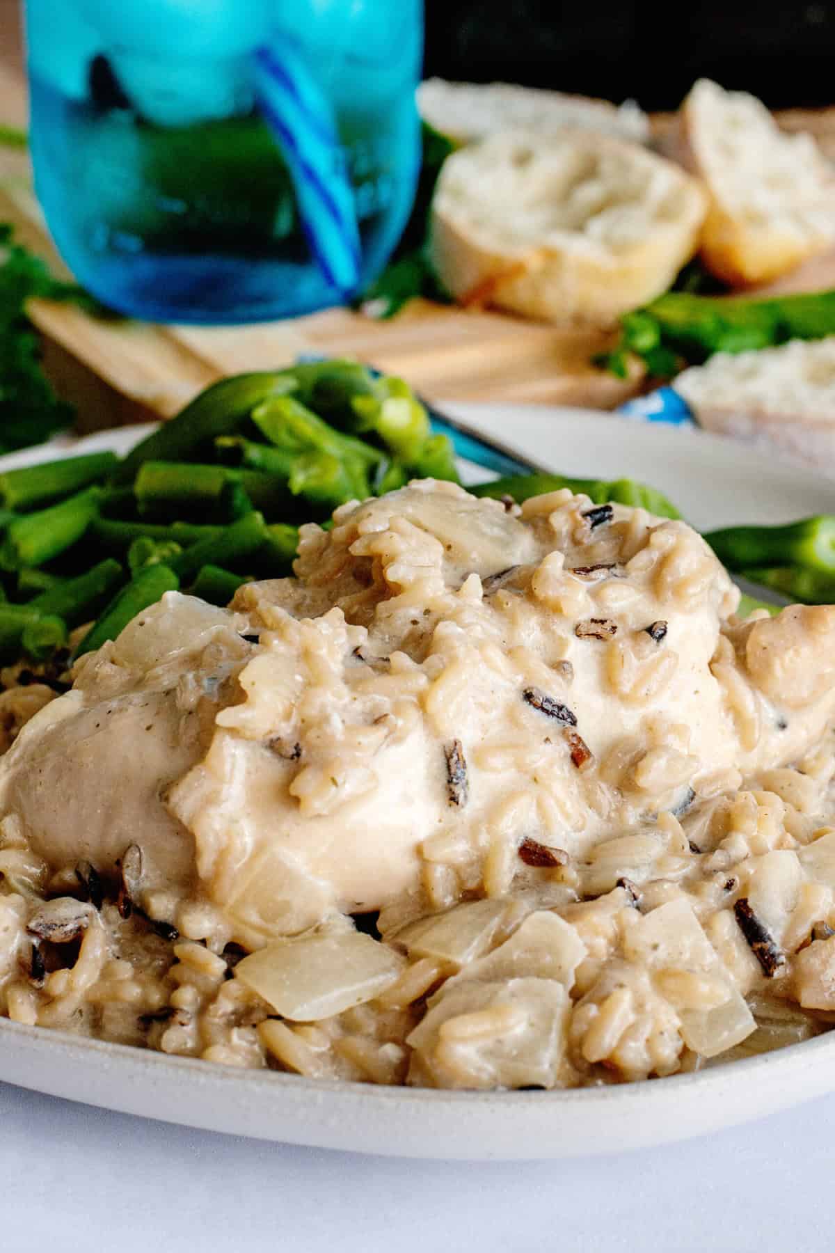 Serve Slow Cooker Chicken and Wild Rice with veggies and crusty bread