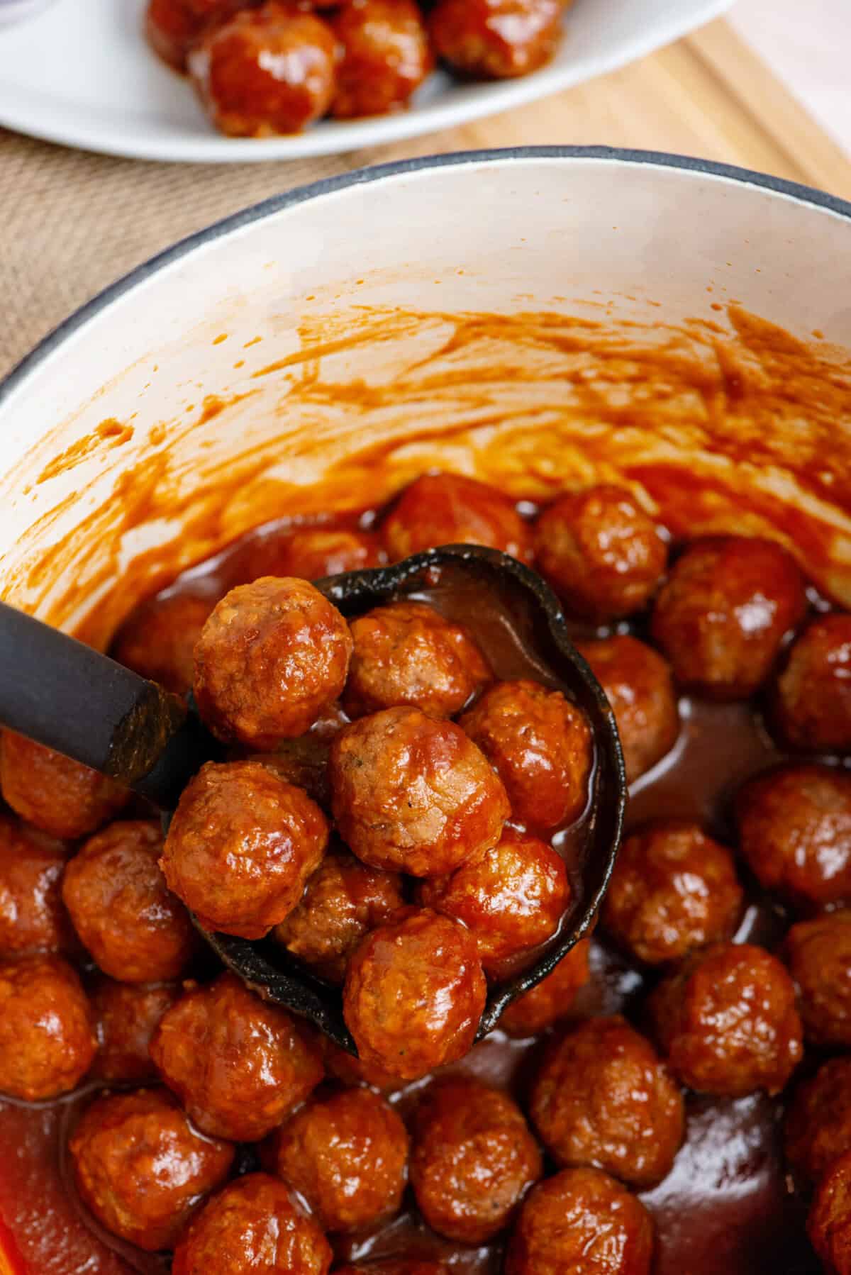 reduce sauce and cook meatballs