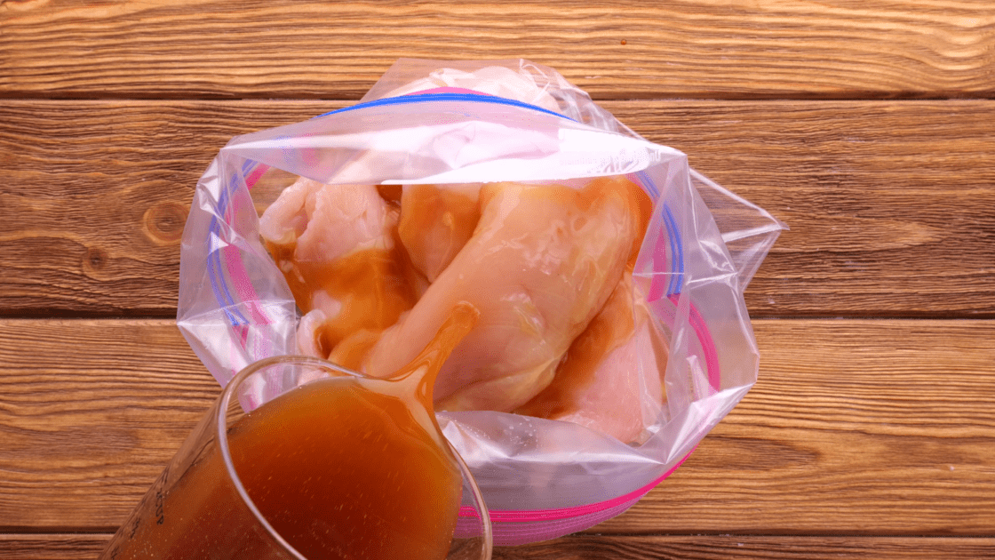 Combine chicken and marinade in ziplock bag.