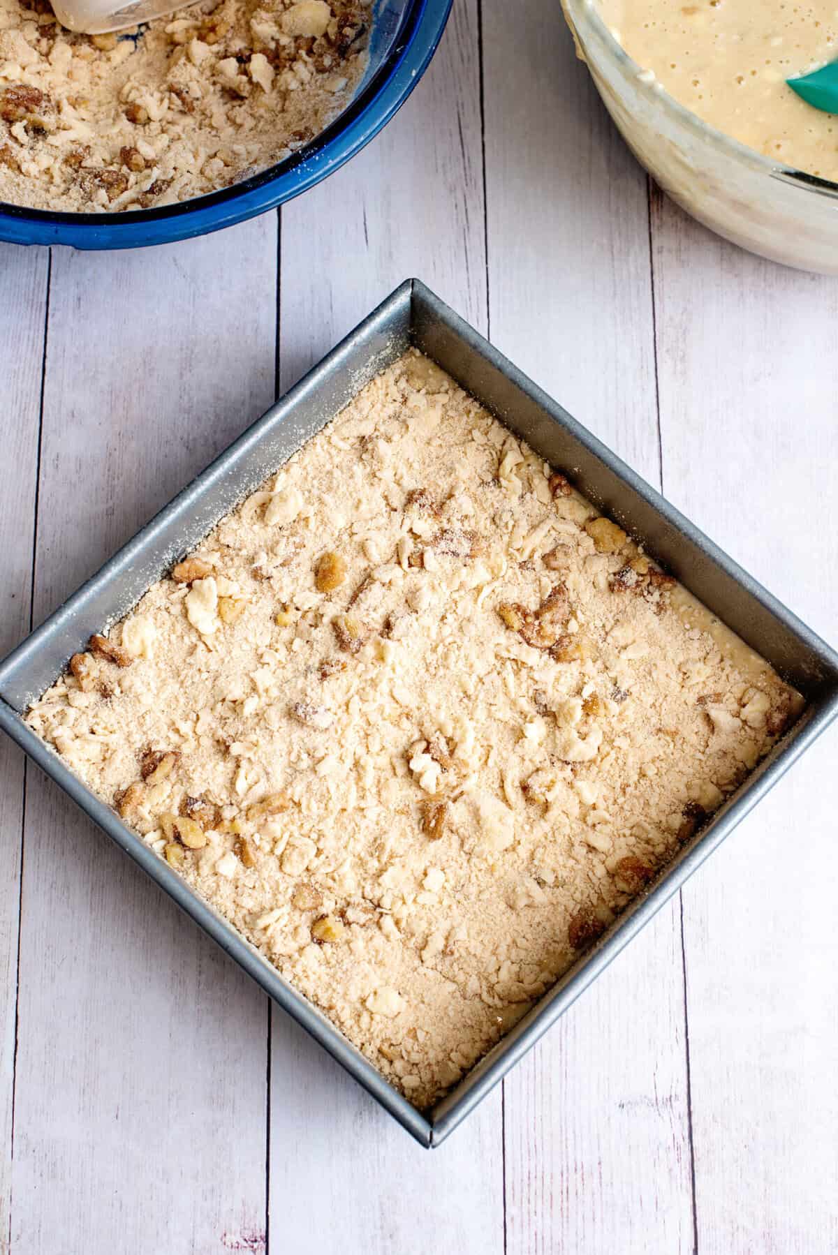 Add crumb mixture into first batter layer