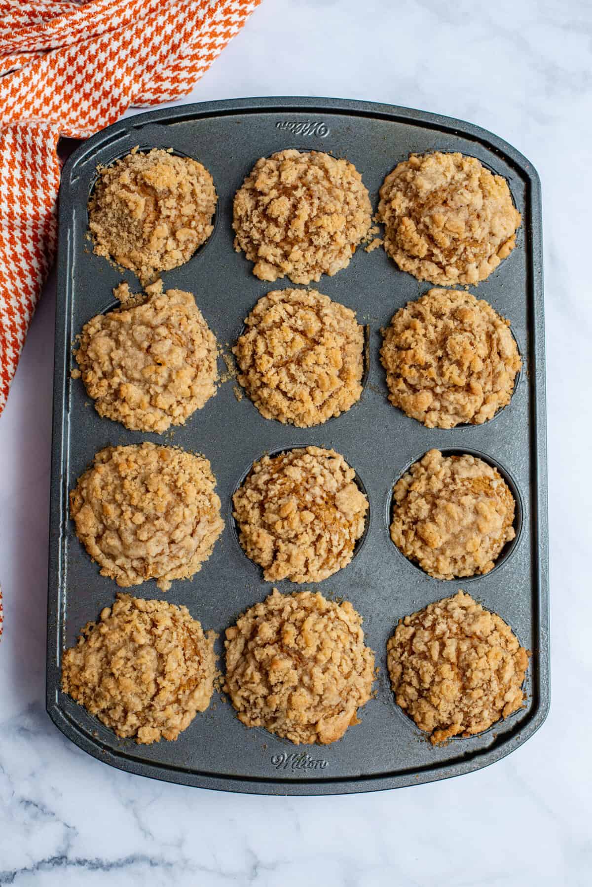 bake pumpkin spice muffins with streusel topping