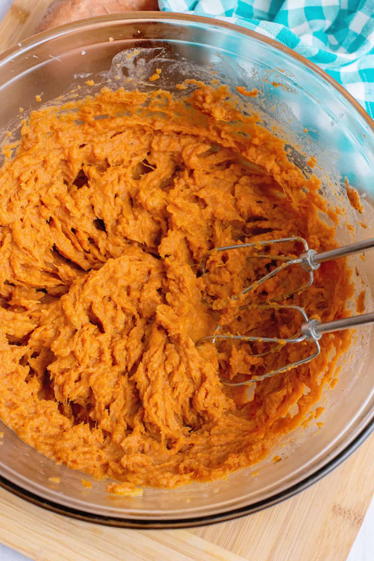 Beat sweet potatoes with mixer