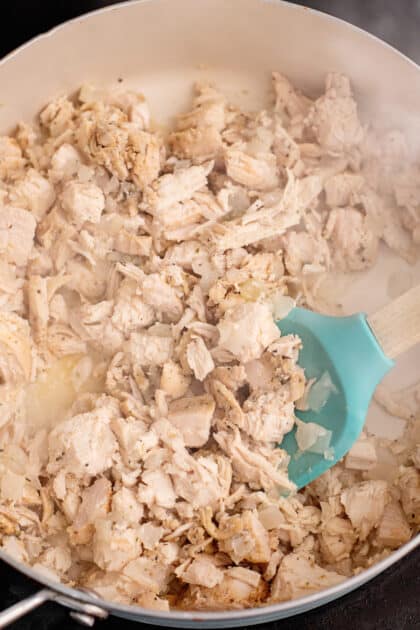 Cook chicken and onion until soft.