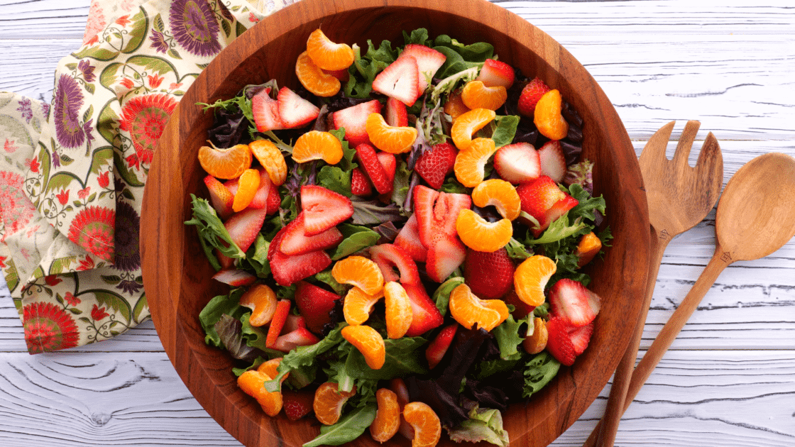 Add mandarin oranges to salad bowl.