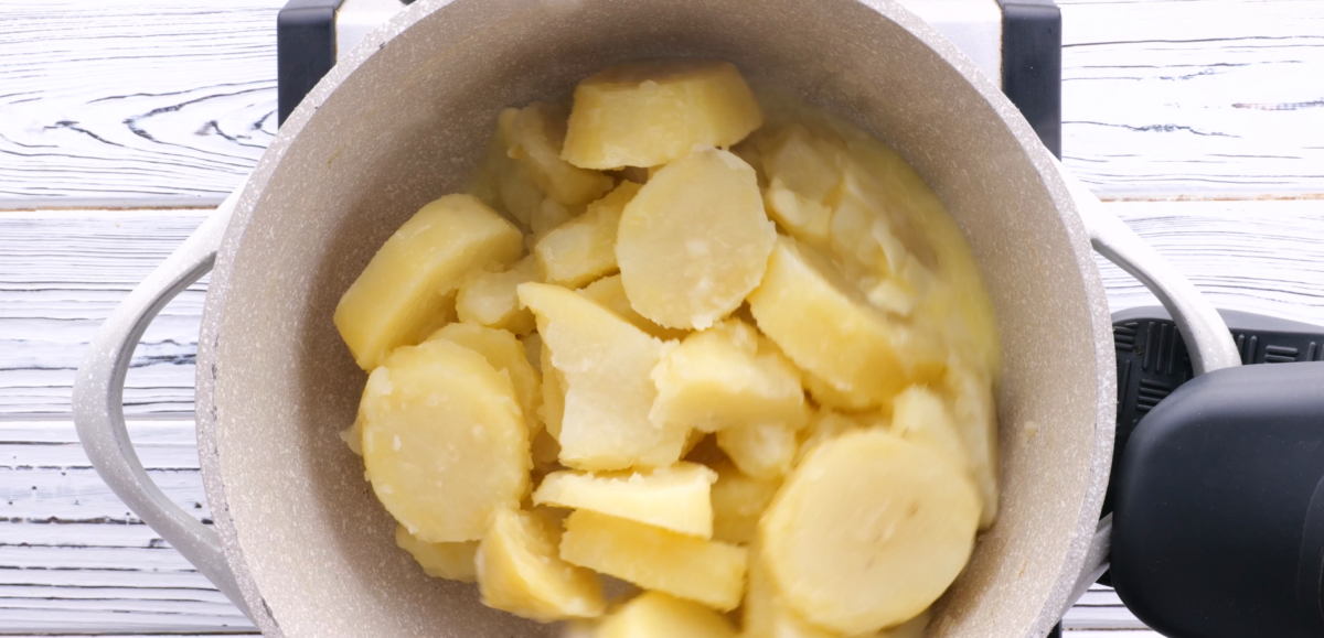 Let butter melt and gently mix it into the potatoes.