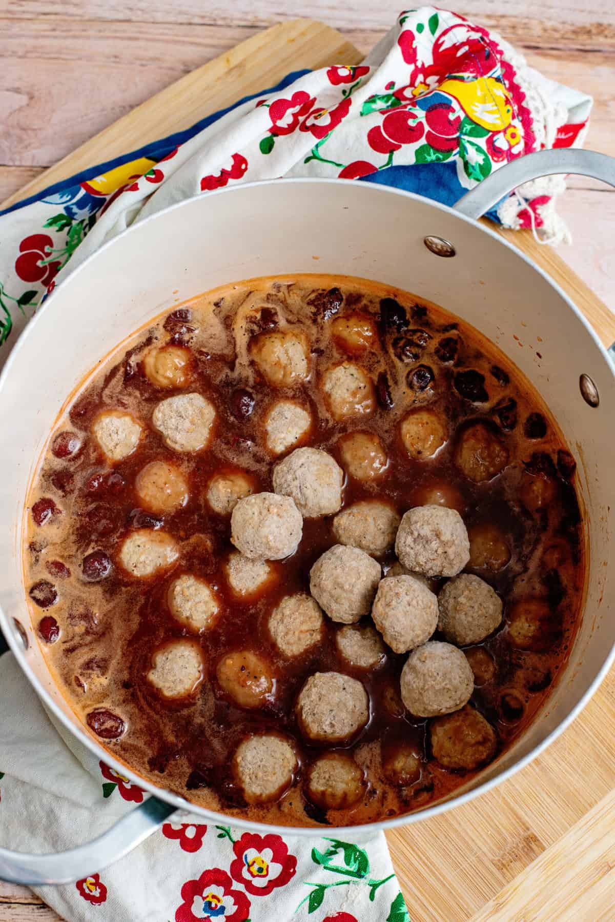 Bring to a boil and add meatballs