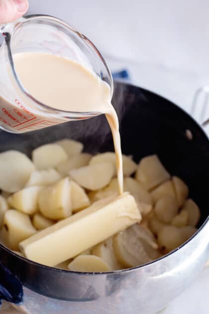 Add evaporated milk to pot.