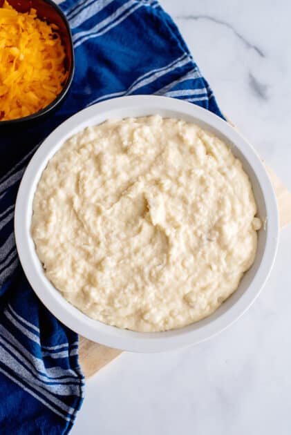 Spread potato mixture in deep-dish pie plate.