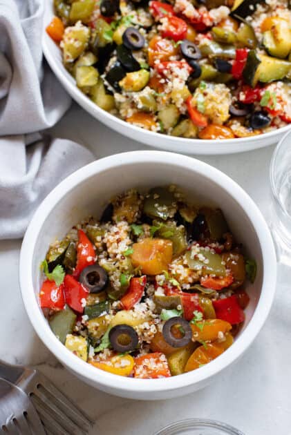 A bowl of Mediterranean quinoa salad.