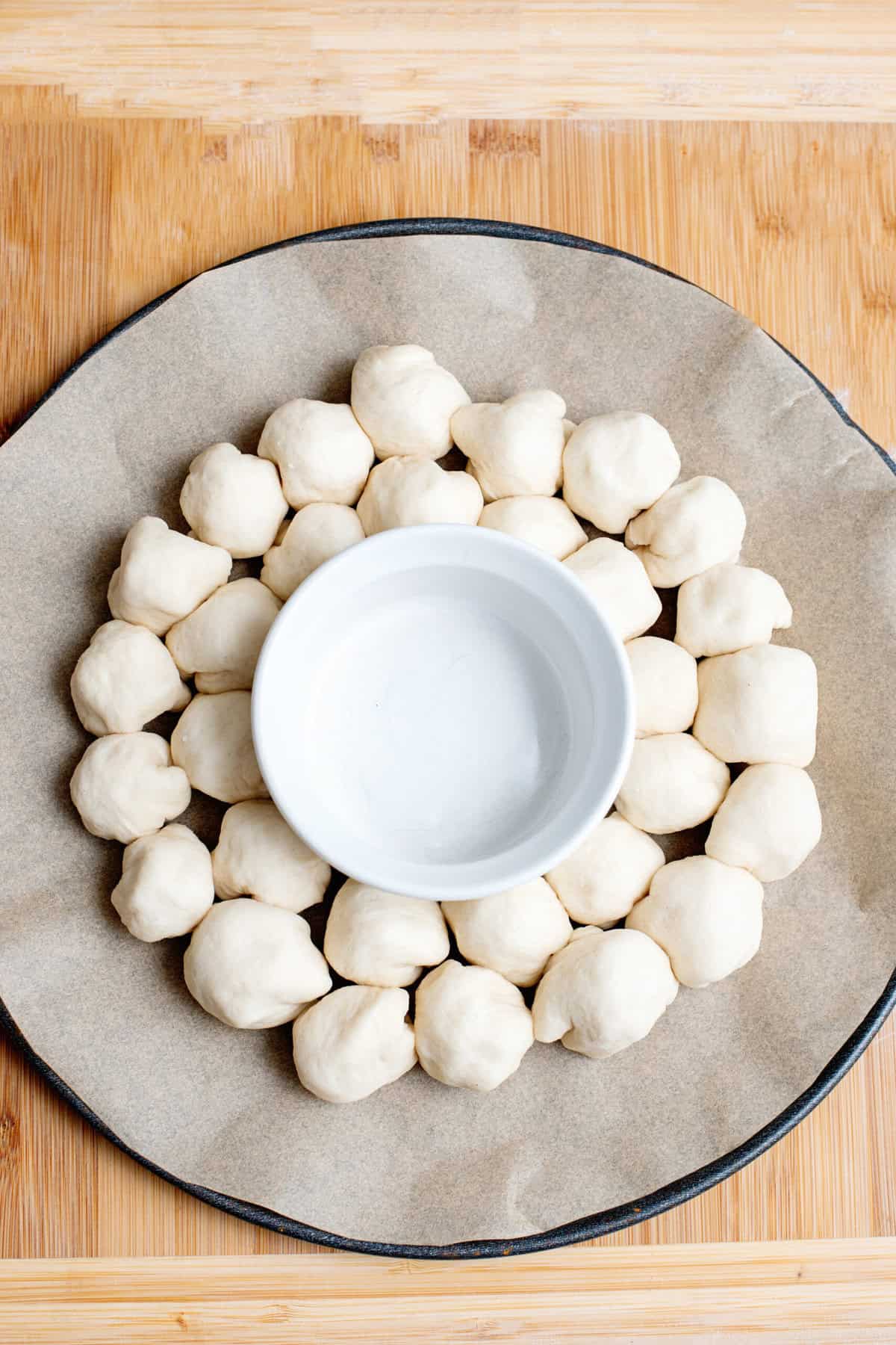 place ramekin in center to form Cheesy Pull Apart Bread Christmas Wreath