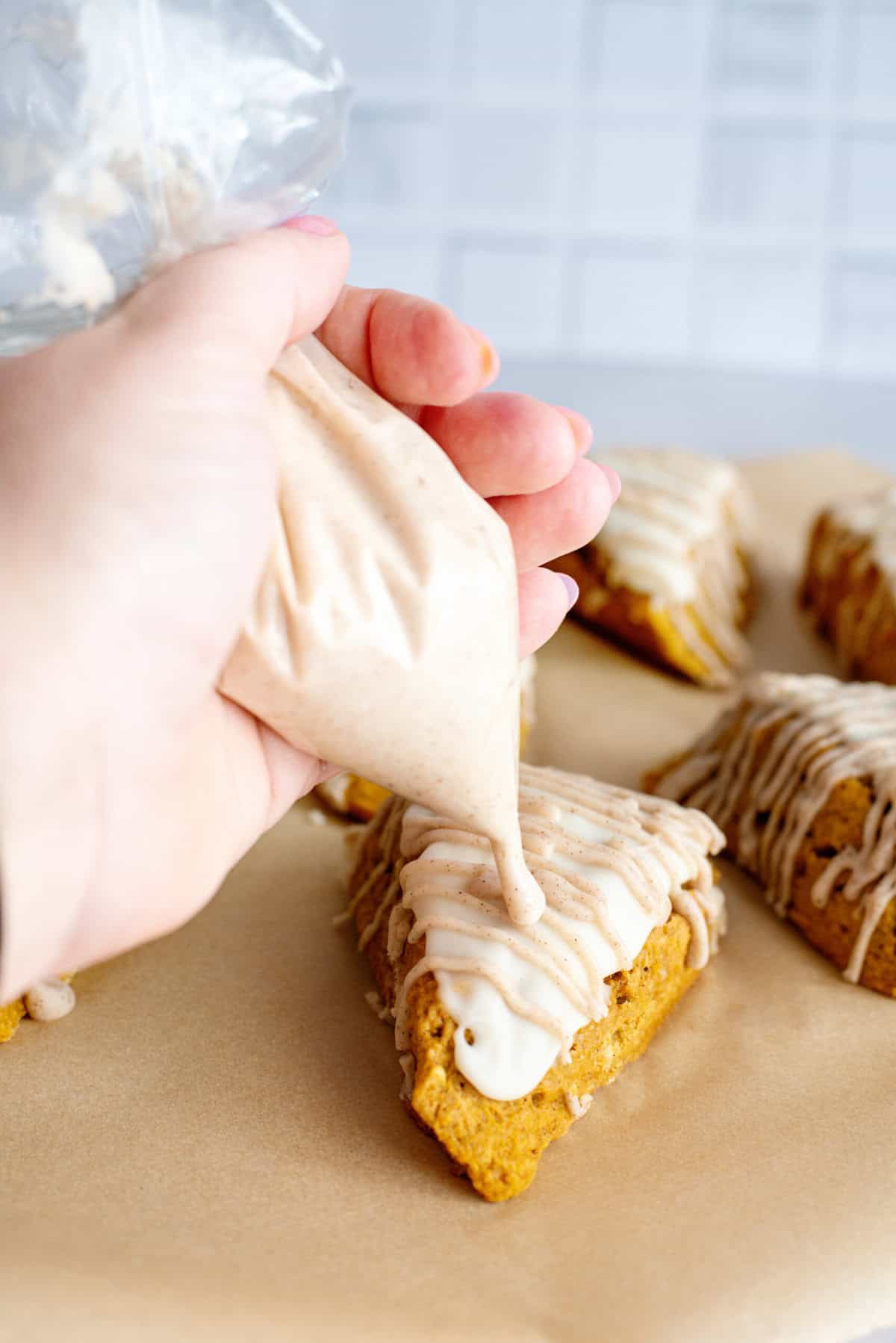 Pipe spiced glaze onto Pumpkin Scones