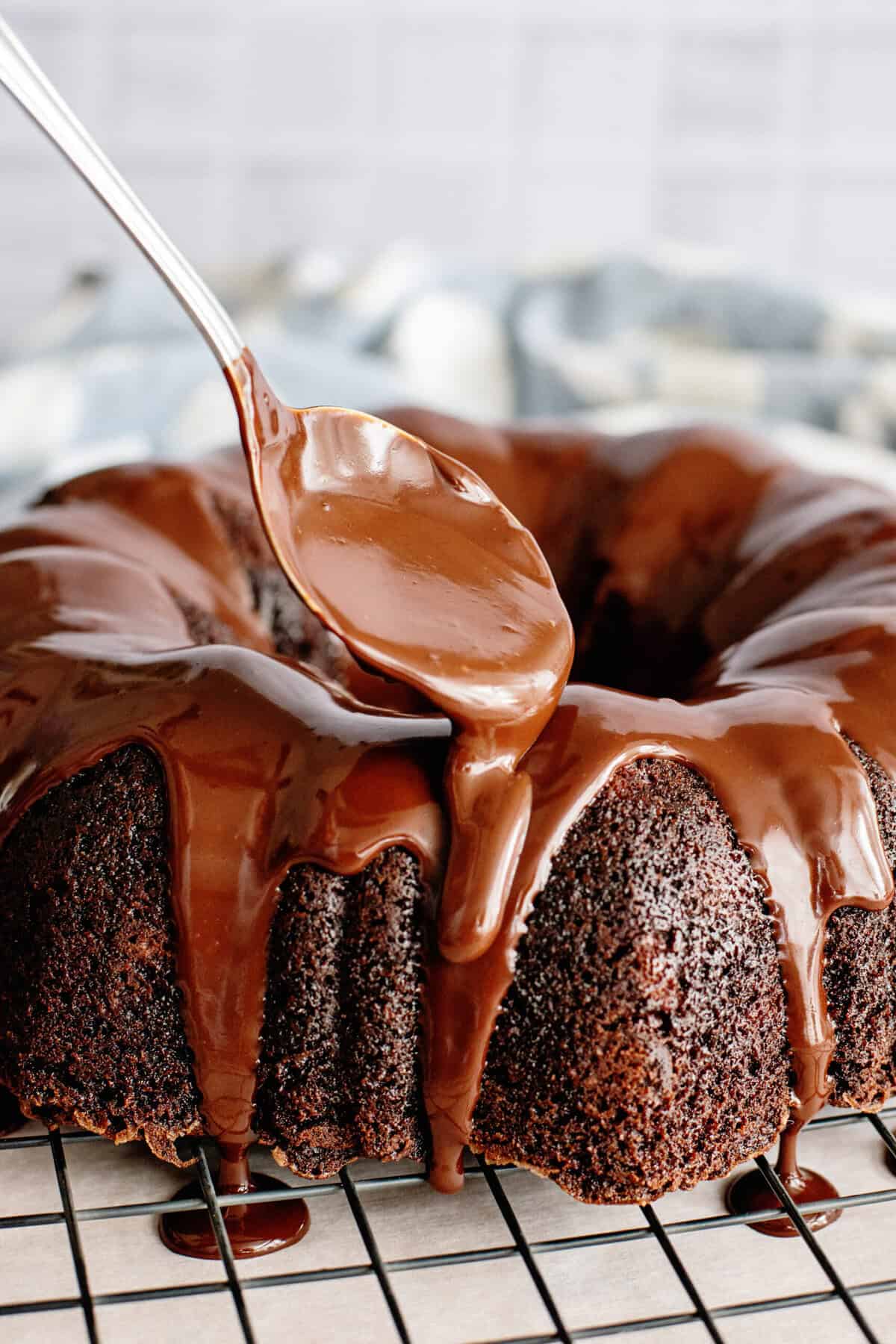 pour ganache over Chocolate Zucchini Cake