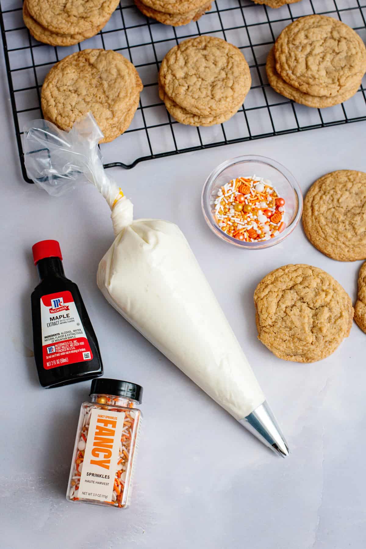 Frosted Maple Cookies ready for piping