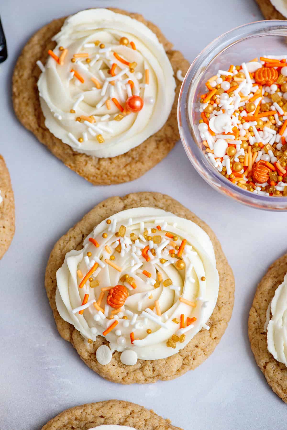 Add sprinkles over Frosted Maple Cookies