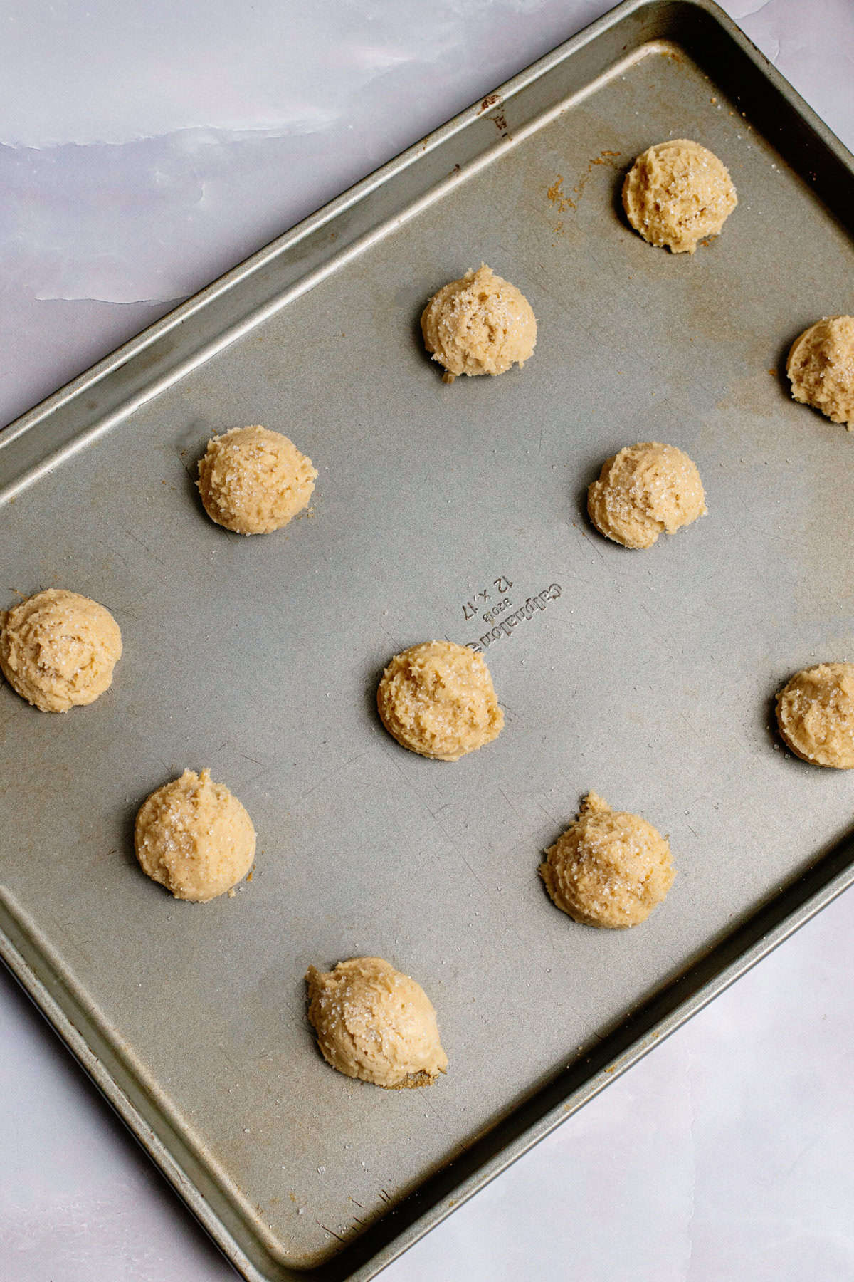 Drop Eggnog Cookie dough onto baking sheet