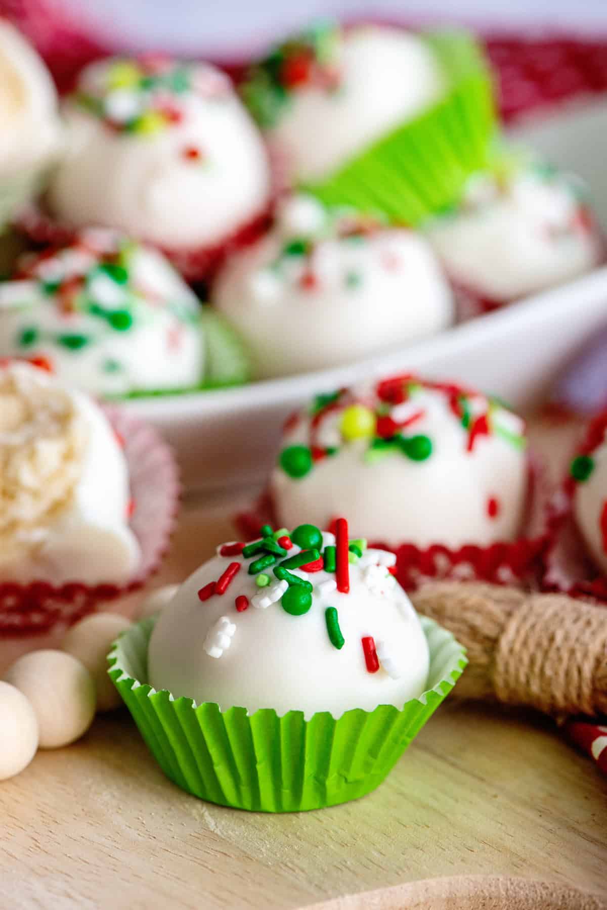 Sugar Cookie Cake Balls decorated for Christmas.