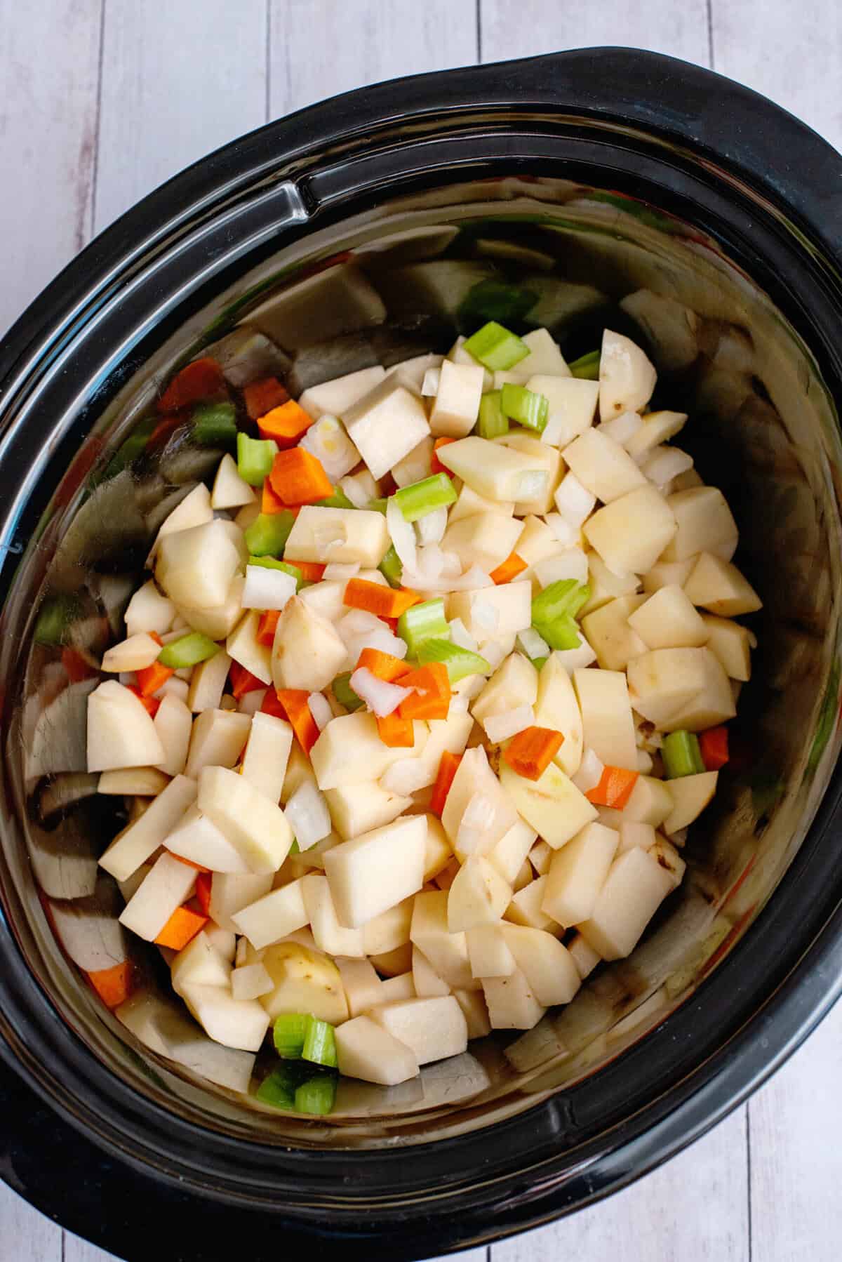 add vegetables to crockpot