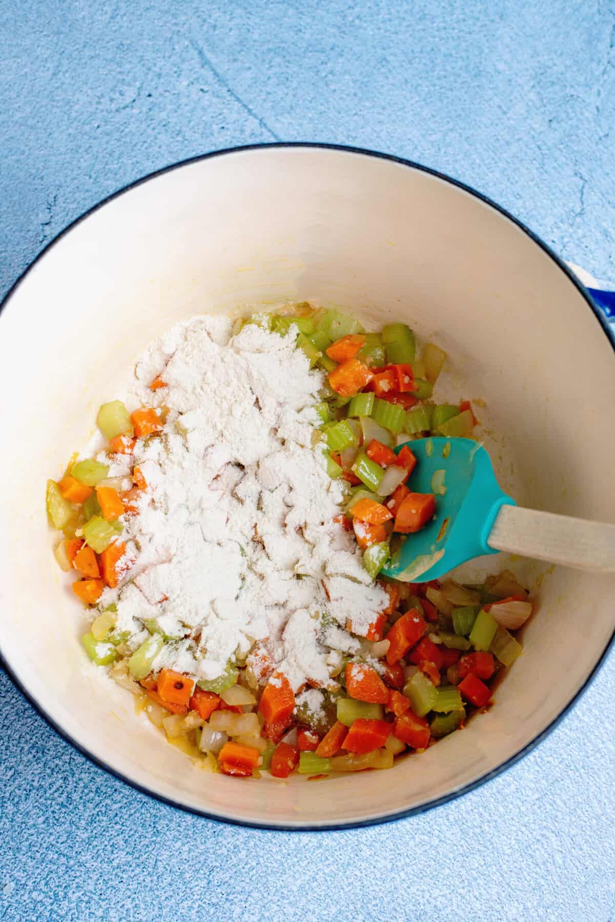 sprinkle flour over vegetables