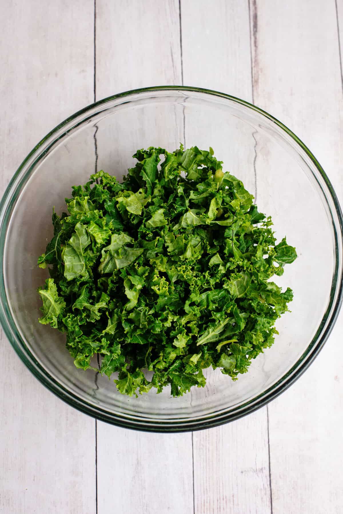 place kale in large bowl