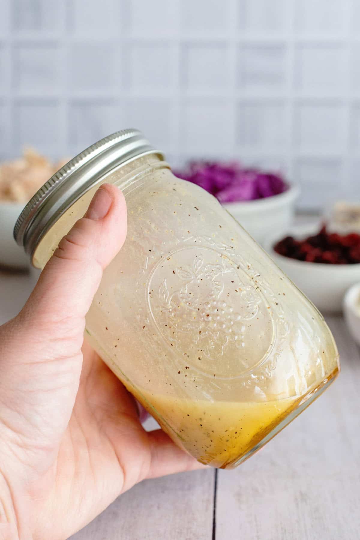 shake dressing ingredients in a jar