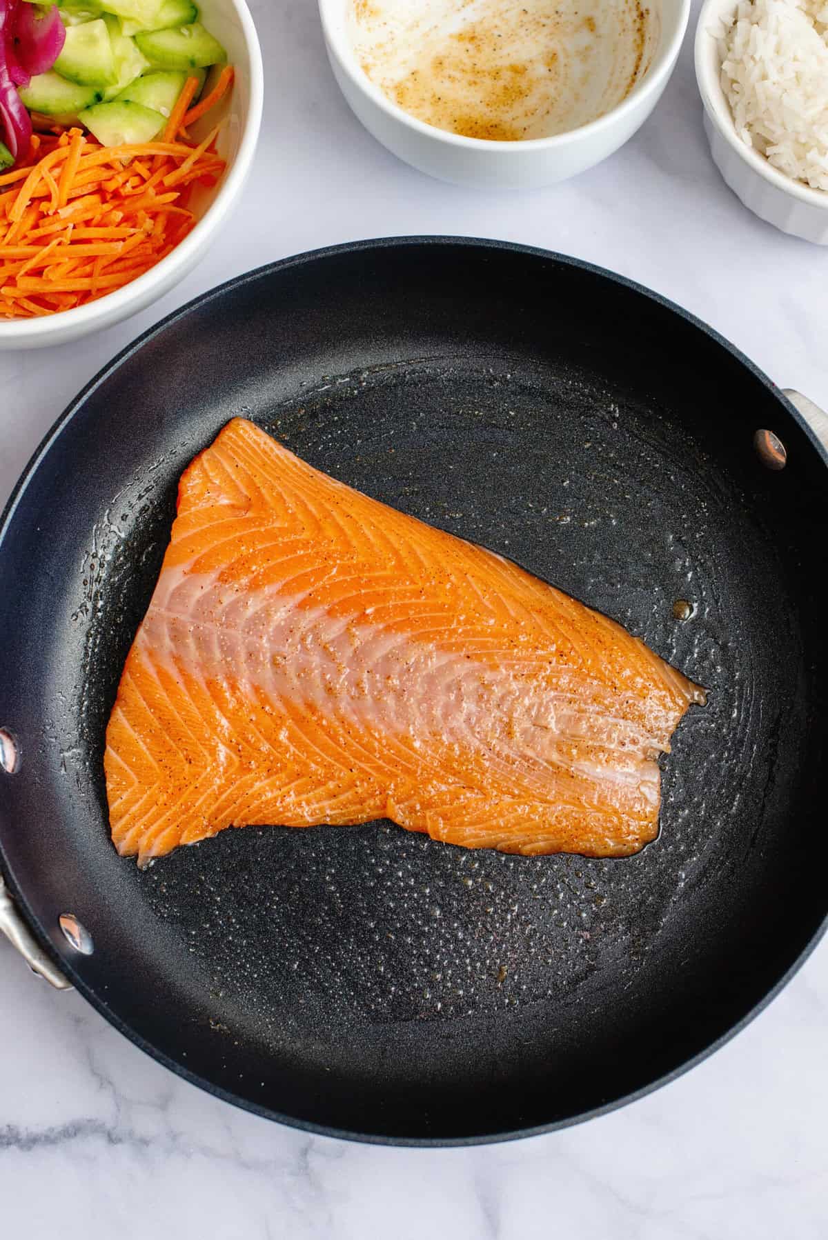 Cook salmon in skillet