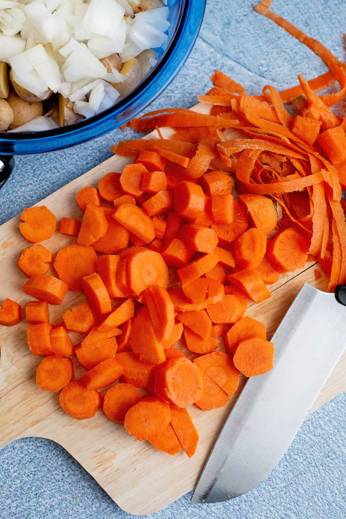 Peel and slice carrots