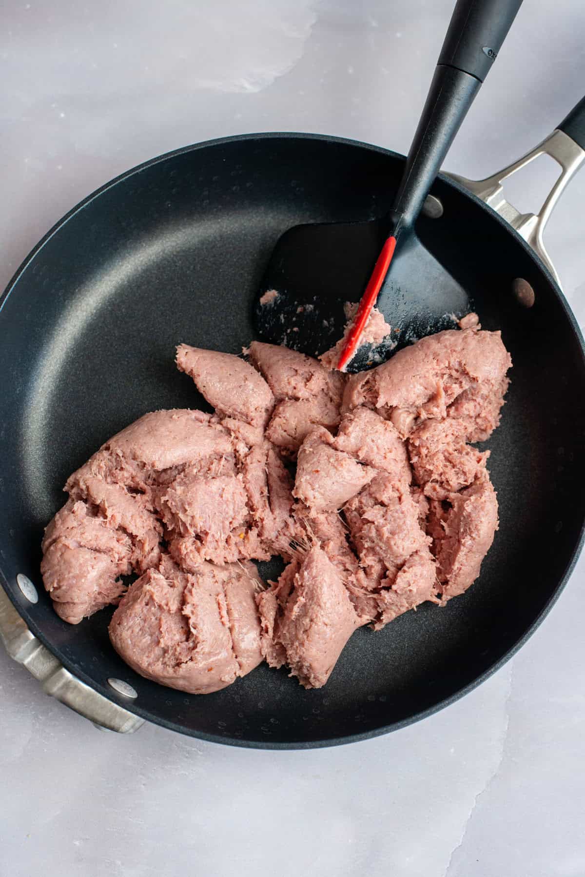 Brown turkey sausage in a skillet