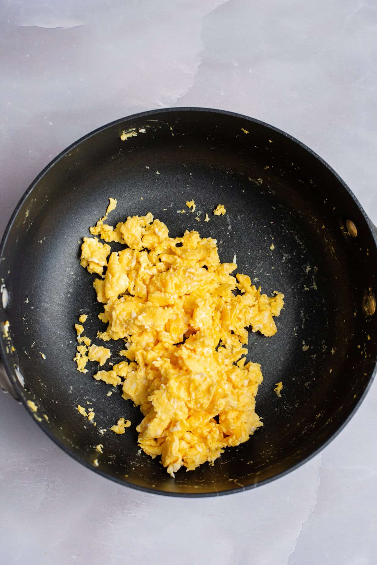 scramble eggs and remove from skillet