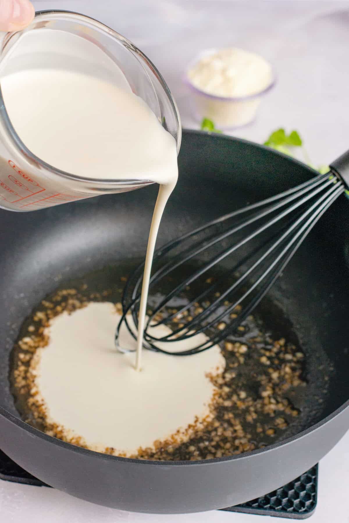 pour cream into skillet