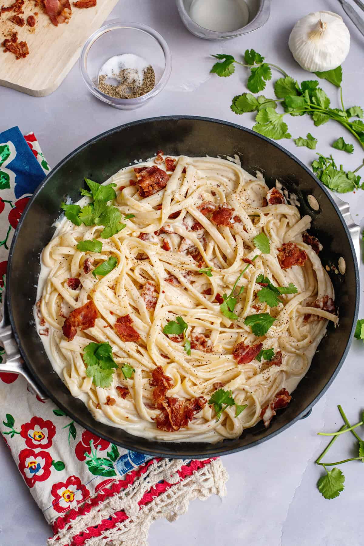 stir crispy bacon into pasta mixture