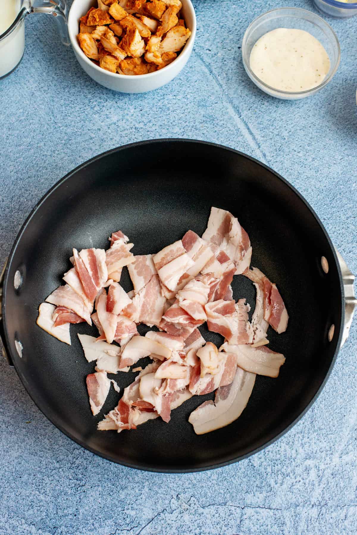 Cook bacon in a skillet