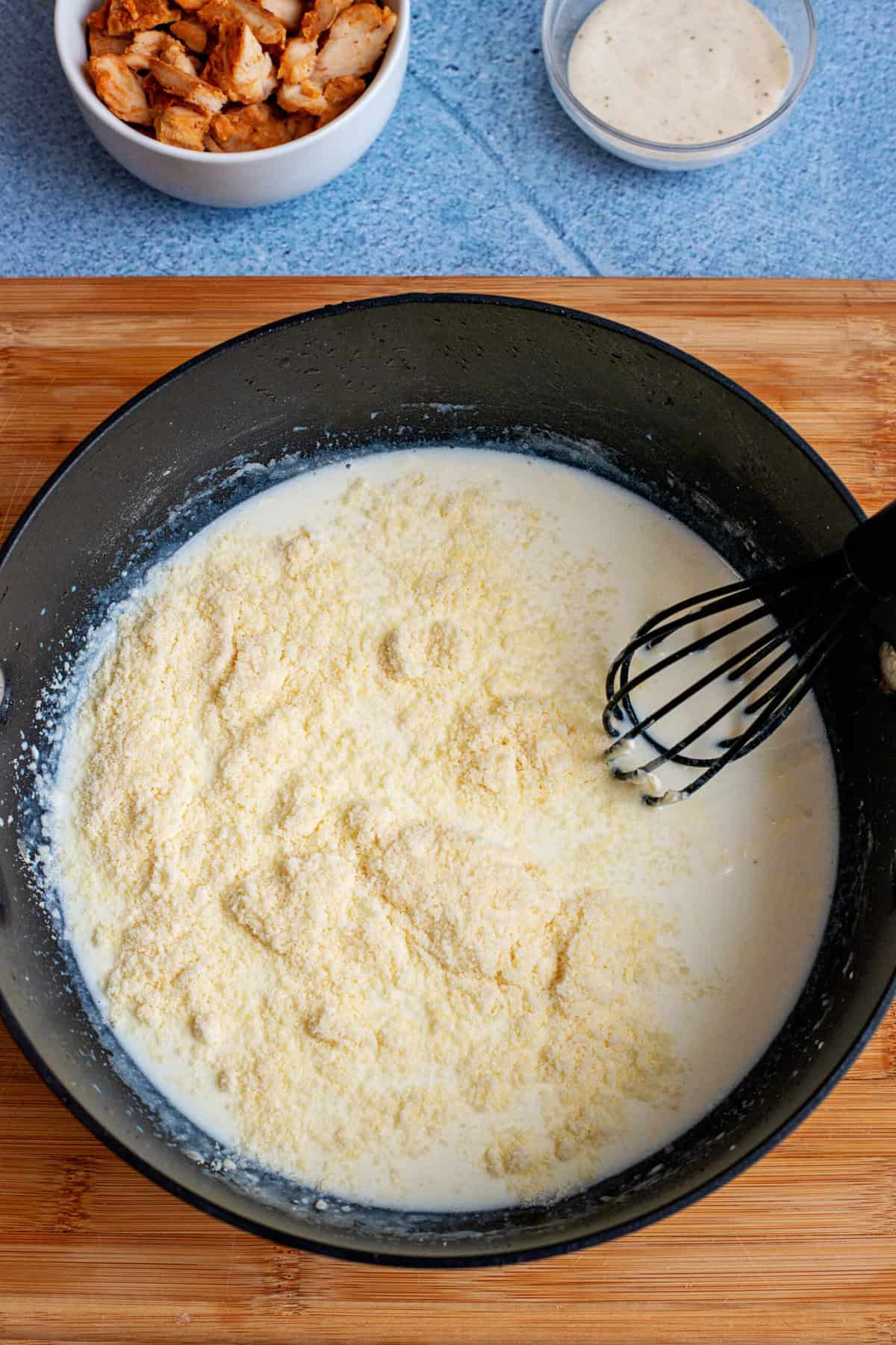 Stir parmesan cheese into the mixture