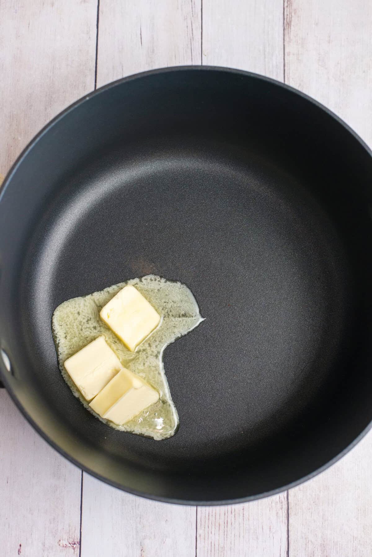 Add butter to large pan