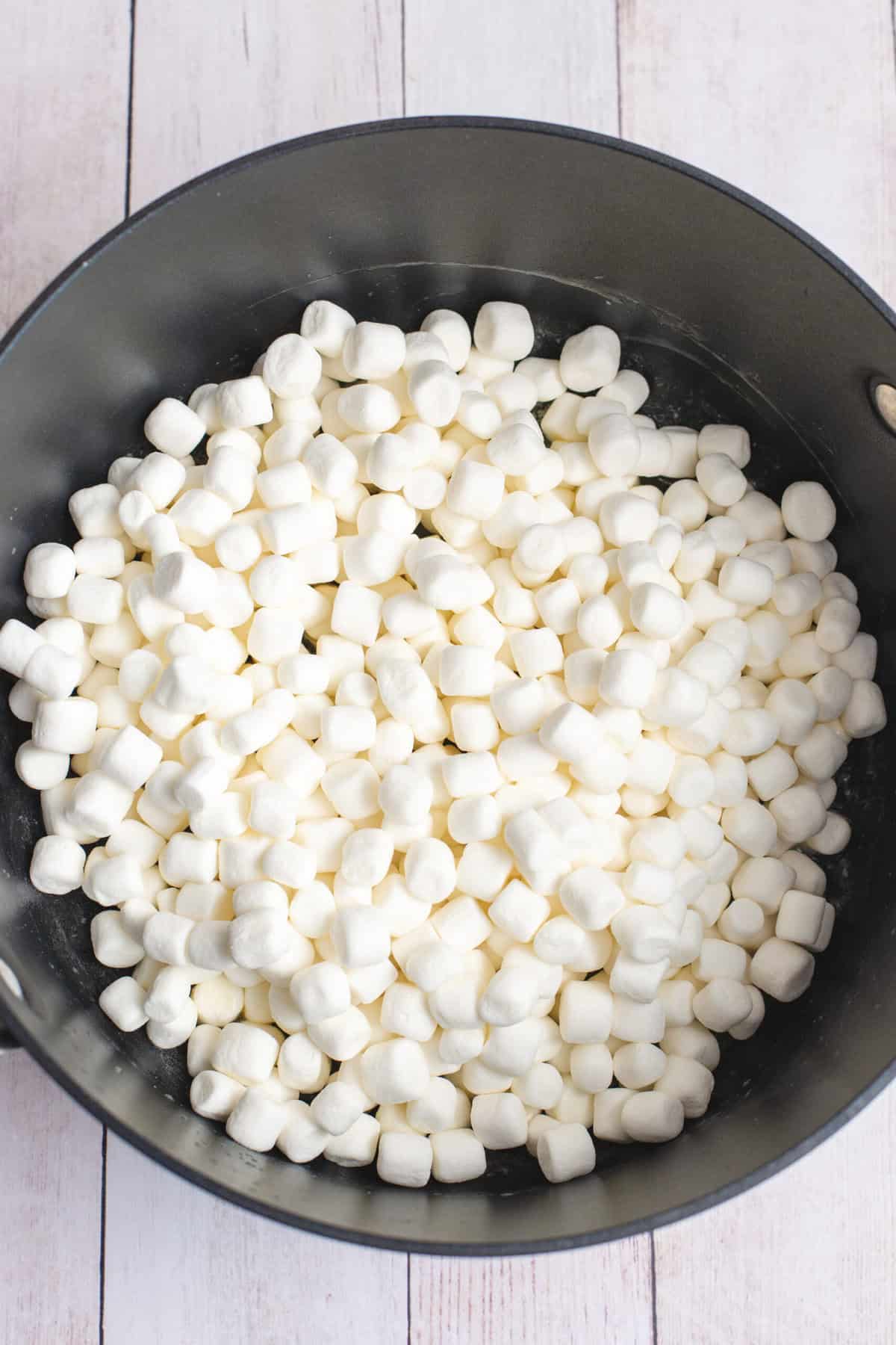 Add mini marshmallows to melted butter