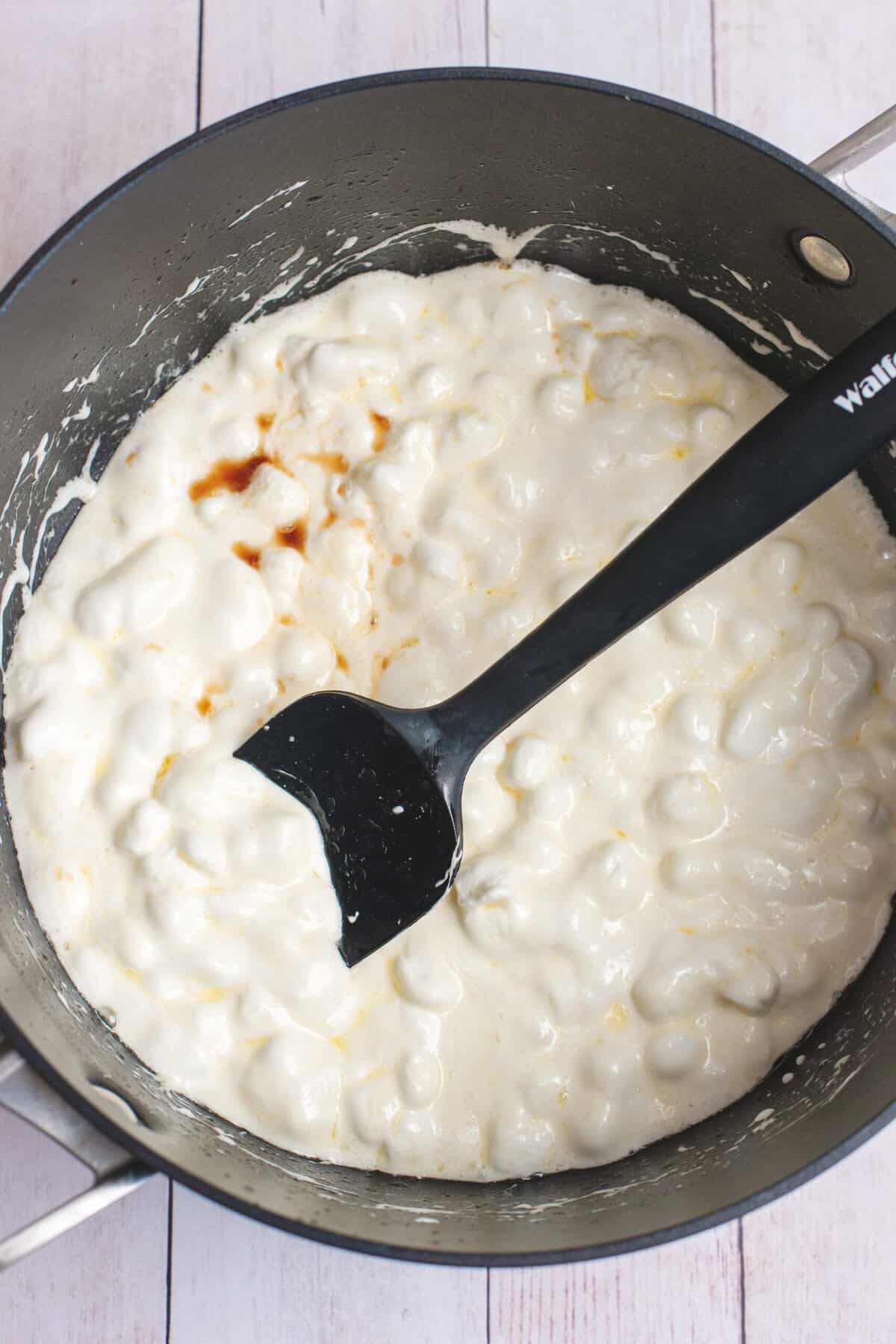 Stir marshmallows until smooth